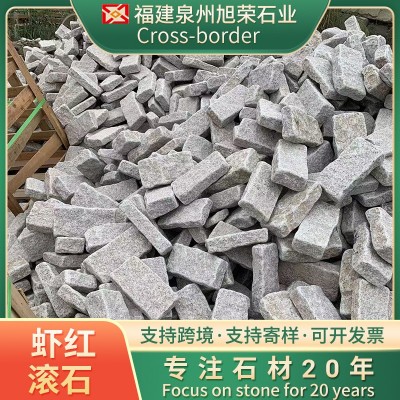 跨境加工虾红滚石花岗岩石材石井虾红漳州虾红地铺石火烧板路沿石